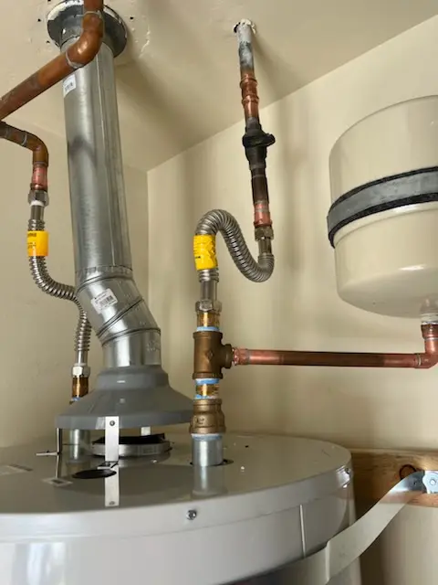 Water heater installation and plumbing repair in Pluckemin
